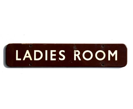 An LMS railway 'Ladies Room' enamel sign, 46cms (18ins) wide. 9cm (3.5 ins) highCondition Report3.5ins high.