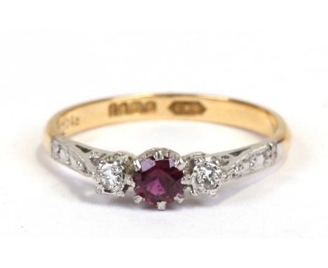 An 18ct gold diamond and ruby ring, approx UK size 'M'.Condition ReportGood overall condition