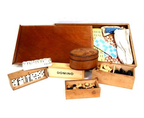 A group of vintage games to include Dominoes and chess.
