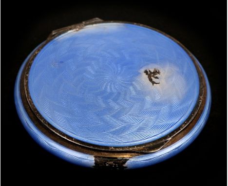 An Art Deco silver and guilloche enamel compact, 5.5cms (2.1ins) wide.Condition ReportChip to the top and chip to the rim.