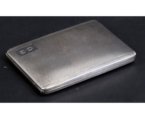 A silver cigarette case with engine turned decoration and initialled 'ED', Birmingham 1928, weight 156g, 11cms (4.3ins) wide.
