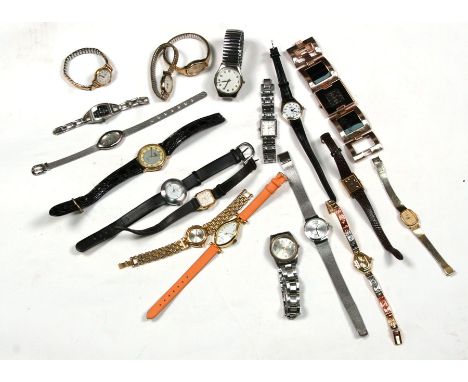 A quantity of ladies and gentleman's fashion wristwatches to include Oris, Timex and others.