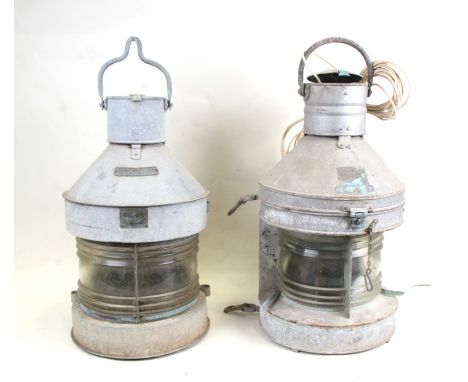 A Davey London mast head galvanised ship's lamp, converted to electricity, 60cms (24ins) high; together with another similar 