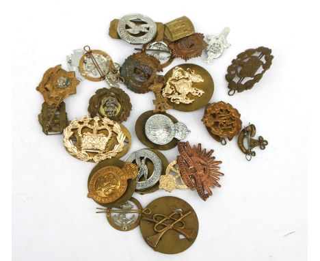 An assortment of 25 Army, Navy &amp; Air Force badges