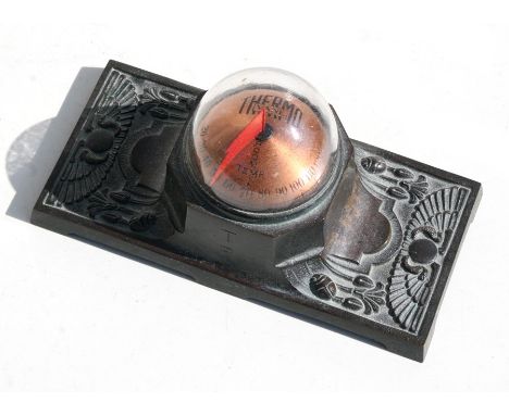A spelter bronzed desk stand with Thermovane thermometer, 16cms (6.25ins) wide.