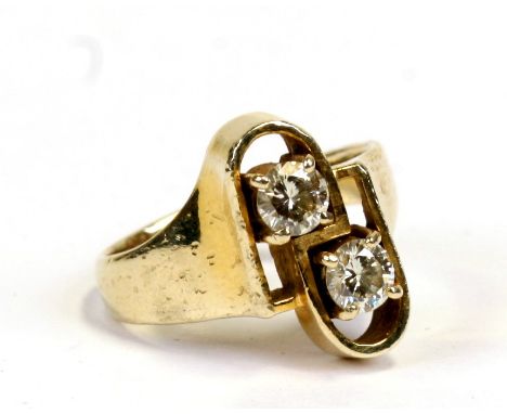 A 14ct gold and two-stone diamond cross-over ring, approx. UK size 'K', boxed. 5.1g