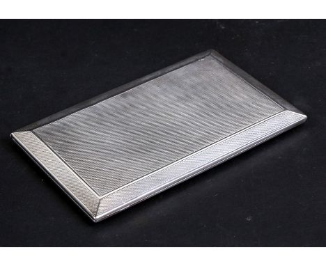 An Edwardian silver cigarette case with engine turned decoration, Asprey patent no. 21914, London 1905, weight 198g, 13cms (5