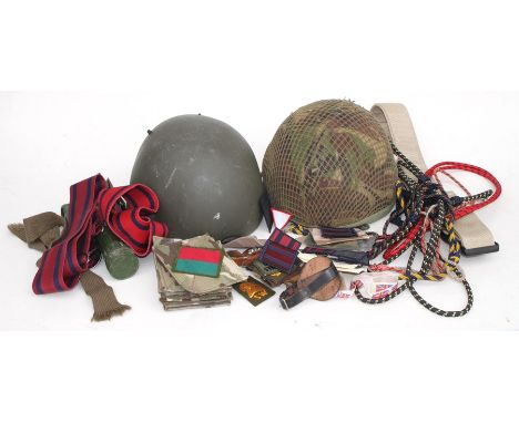 A quantity of original British Army equipment and badges, including Stable Belts, Lanyards, W.O.s wrist badges, sleeve Badges