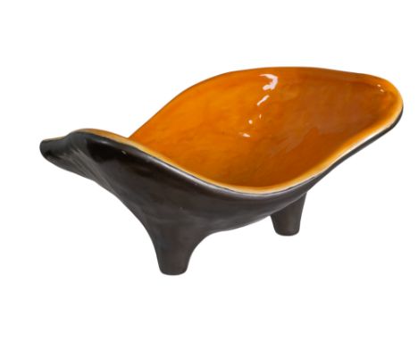 French c.1950s An orange and black freeform ceramic bowl  Dimensions: 7.5 in. (H) x 12 in. (D)  