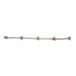 British, Circa 1980, A white sapphire and silver line bracelet