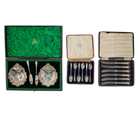 A mixed lot of silver, to include: [a] six silver teaspoons from Harrods, hallmarked [b] six silver butter knives, hallmarked