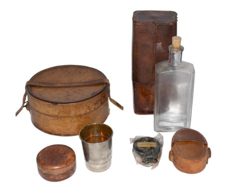Continental A collection of campaign (?) items [a] A collapsible white metal gilt stirrup-type cup in leather case [b] A leat