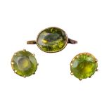 Continental, Circa 1930, A pair of peridot and yellow gold ear studs and ring