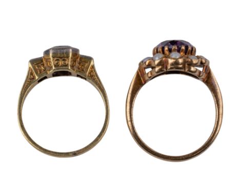 Continental Circa 1920 Two amethyst rings [a] An amethyst and diamond three stone ring [b] An amethyst and split pearl cluste