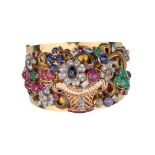 Continental, Art Deco, Circa 1935, A striking multi-gem set giardinetto bangle