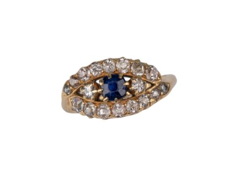 British 19th Century A sapphire and diamond crossover cluster ring Mounted in yellow gold &nbsp; Ring size: K Weight: Approx.