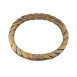 Continental, Circa 1980s, A three coloured 18 carat gold flattened twist bangle