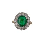 Continental, Circa 1955, A fine emerald and diamond cluster ring