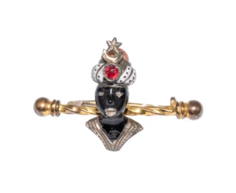 Continental Circa 1920 A gold, silver, enamel and gem set Blackamoor bar pin  Weight: Approx. 5.78 grams Dimensions: 3.5 cm. 