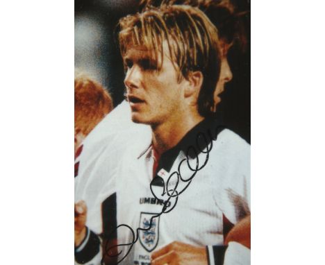 David Beckham signed 6x4 colour England photo. English former professional footballer, the current president and co-owner of 