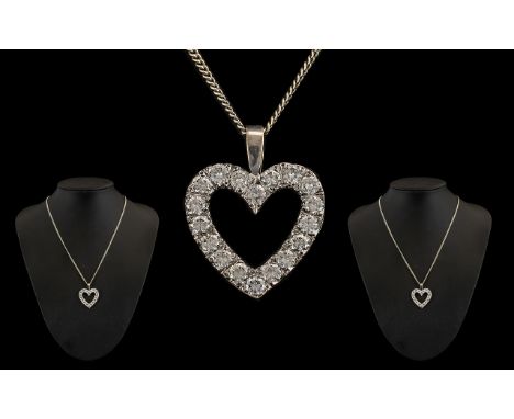 18ct White Gold Impressive Diamond Set Heart Shaped Pendant with attached 18 ct white gold chain. Both pendant and chain mark