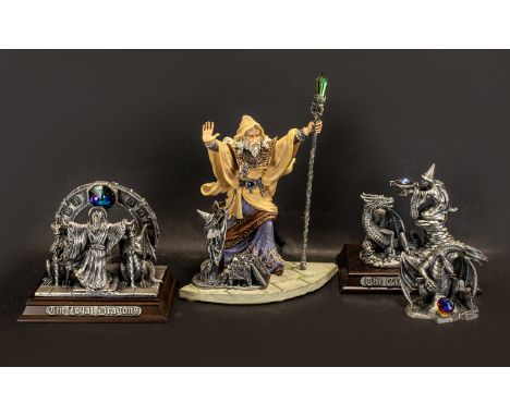 A Collection of Tudor Mint Myth and Magic Figures (4)collectable figurines in boxes consisting of Loyal Dragons, The Gift Of 