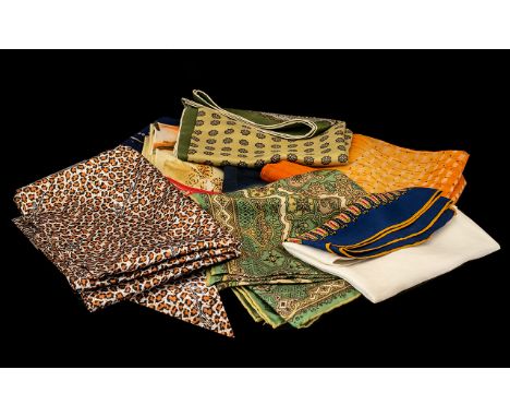 Collection of Vintage Scarves comprising five mixed material scarves: a cotton paisley print square in red and grey; and thre