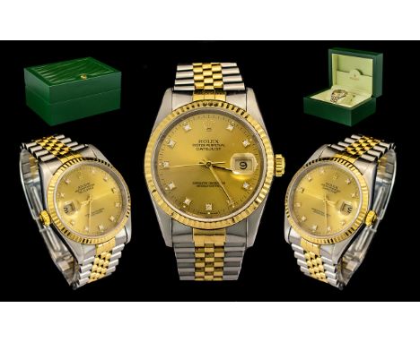 Rolex Oyster 18ct Gold and Steel Perpetual Datejust Gents Wrist Watch features a champagne dial, diamond markers, superlative
