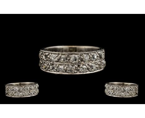 18ct White Gold Attractive Channel Set Diamond Ring - From the 1930's.Set with 20 old round brilliant cut Diamonds of good sp