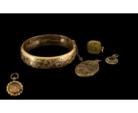 Small Mixed Lot of Jewellery to include a 9ct rolled gold hinged bangle with floral etched front, 9ct back and front oval loc