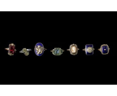 Seven Vintage Dress Rings - three with 9ct gold shanks with blue enamel. A/F. 