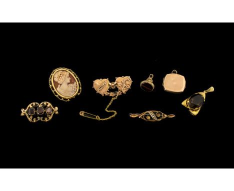 A Good Collection of Antique Period and Mid 20thC 9ct Gold Jewellery. 7 pieces in total. Comprising of 1. 9ct gold mizpah swe