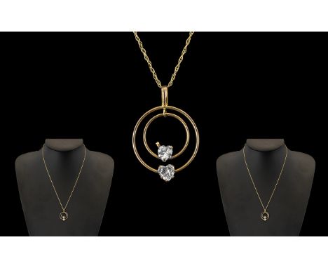 9ct Gold Pendant &amp; 9ct Gold Chain. Fully hall marked for 9ct gold, pendant with heart shaped stones, suspended on 9ct gol
