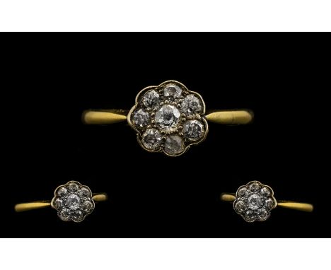 Antique Period 18ct Gold Attractive Diamond Set Cluster Ring flowerhead design. Marked 18ct gold. The old round cut diamonds 