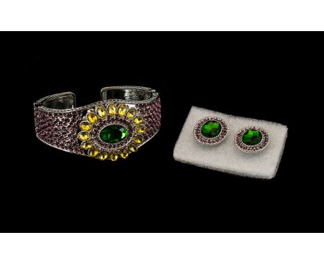 Green, Yellow and Purple Crystal Bangle with matching earrings, the bangle having a central boss comprising a deep green oval