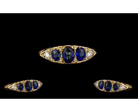 Antique Period 18ct Gold Attractive 5 Stone Sapphire and Diamond Ring - marked for 18ct to interior of shank. The central thr