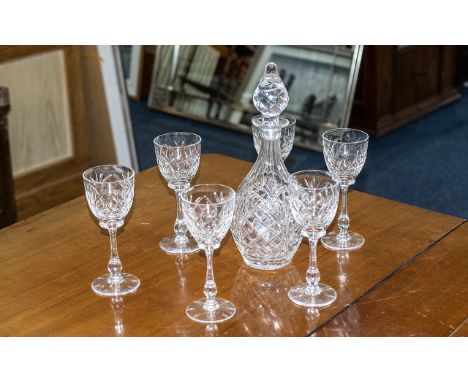 A Cut Glass Decanter and Six Wine Glasses.