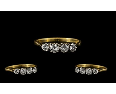 18ct Gold and Platinum Attractive Four Stone Diamond Set Ring, Marked 18ct and Platinum. The Four Brilliant Cut Diamonds of G