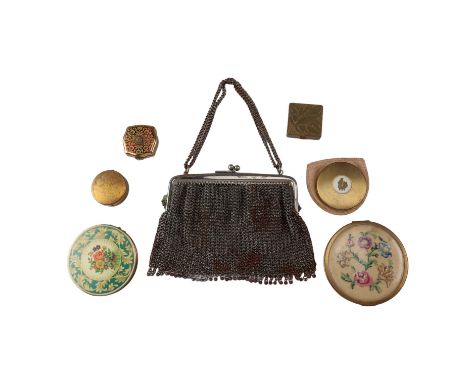 Six vintage powder compacts including two Stratton, a Yardley and an Arden, together with a mesh evening bag