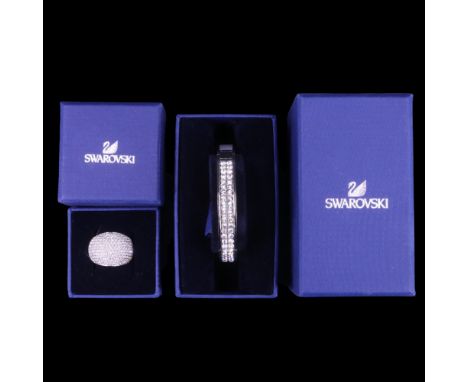 A Swarovski bracelet and ring, in original packaging
