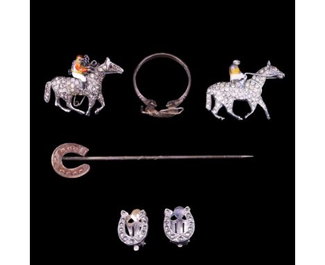 A group of Victorian and later equestrian-themed jewellery including a gold-faced silver horseshoe stick pin, a similar horse
