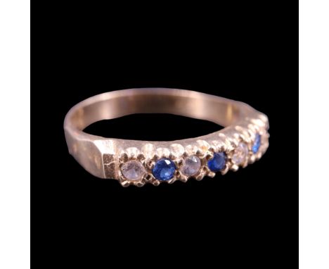 A 9 ct gold, blue and white stone finger ring, Q/R, 2.6 g