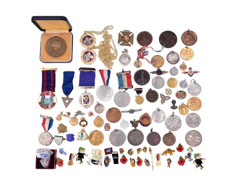 A group of vintage enamel pin badges together with a group of royal commemorative and other badges and medallions 