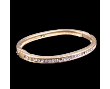 A Swarovski hinged bangle