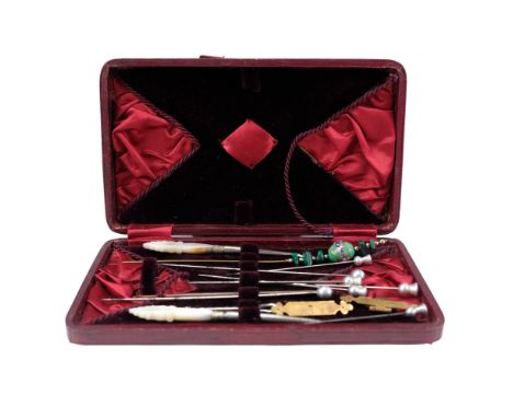 A group of vintage malachite, thistle terminal and other hair pins together with two mother-of-pearl handled dressing accesso