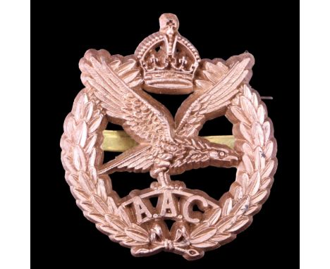 A Second World War economy Army Air Corps plastic cap badge