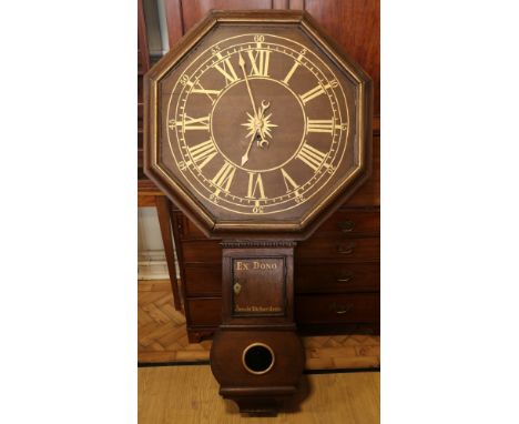 A late 18th / early 19th Century Act of Parliament type clock, having an octagonal wooden face with gilt painted numerals, th