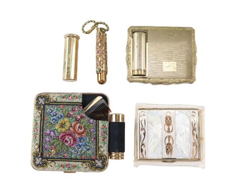 A Stratton combined powder compact and lipstick holder together with a similar compact, another decorated with carved mother-