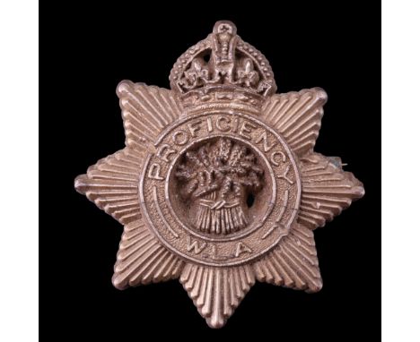 A Women's Land Army plastic proficiency badge