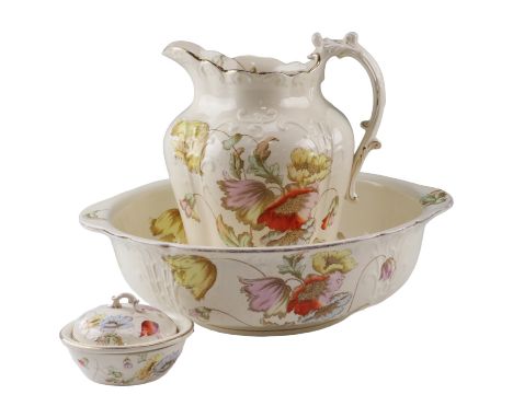 A Victorian floral transfer printed ewer, wash basin and soap dish, ewer 30 cm
